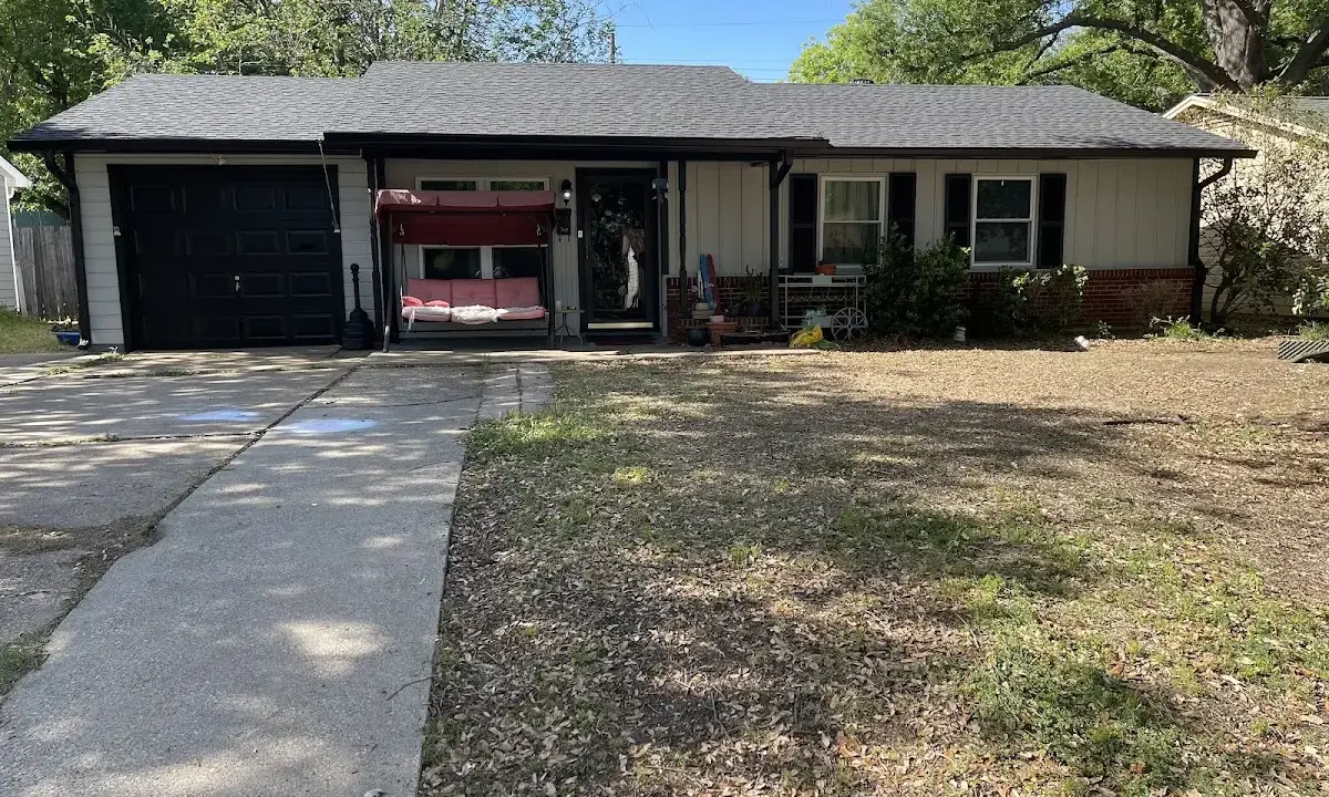 Asphalt Shingle Roof Repair crew at work on a residential roof in West Pensacola